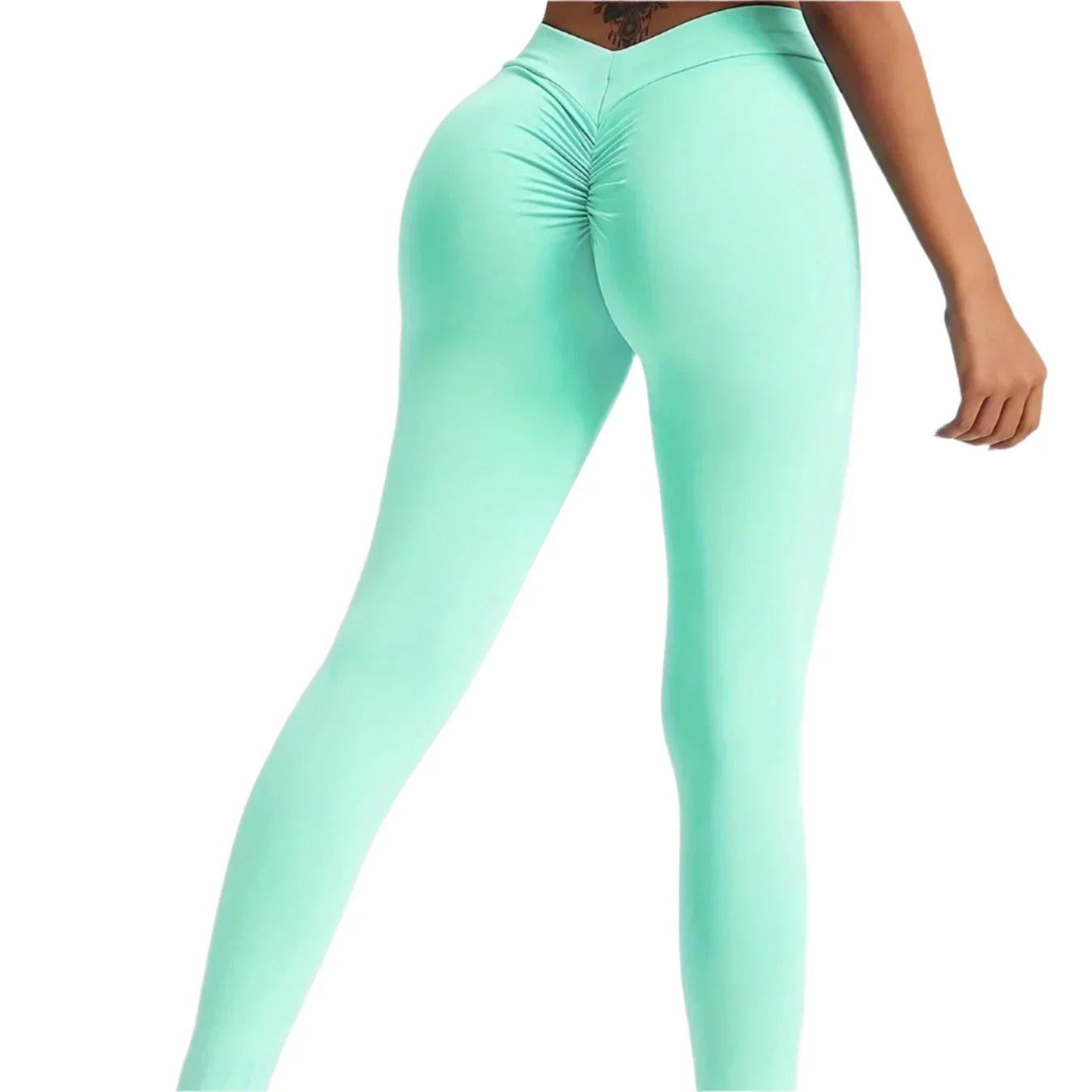 Mint green leggings worn by a person on a light gray background